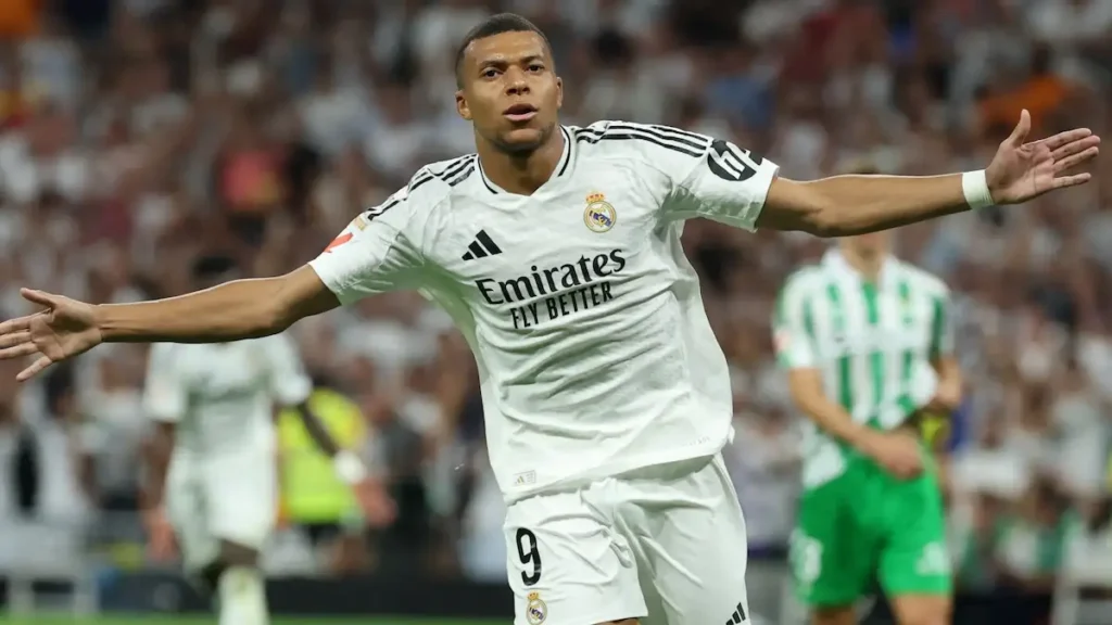 Kylian Mbappé celebrating a goal for Real Madrid at Santiago Bernabéu