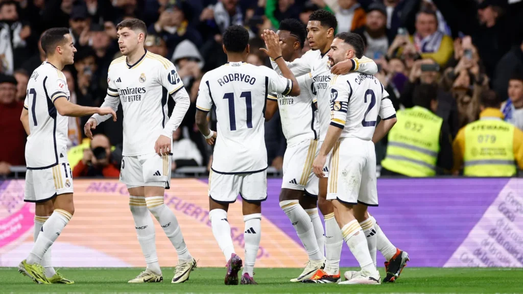 Real Madrid players celebrate a goal against Girona in the 4–0 Bernabéu win.