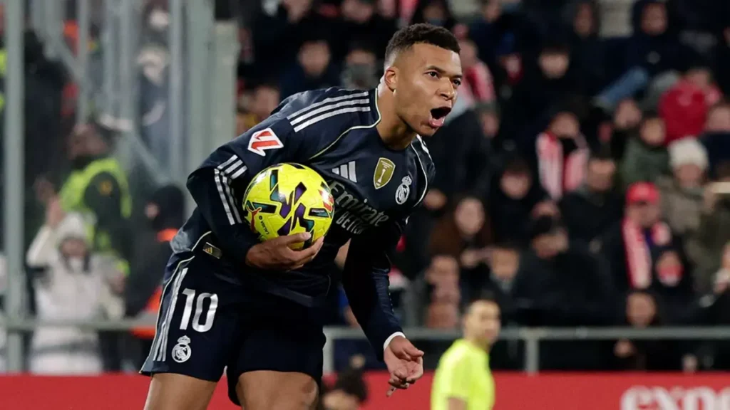 Kylian Mbappé celebrates after scoring a penalty for Real Madrid against Girona at Montilivi