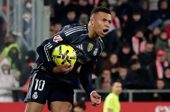 Kylian Mbappé celebrates after scoring a penalty for Real Madrid against Girona at Montilivi
