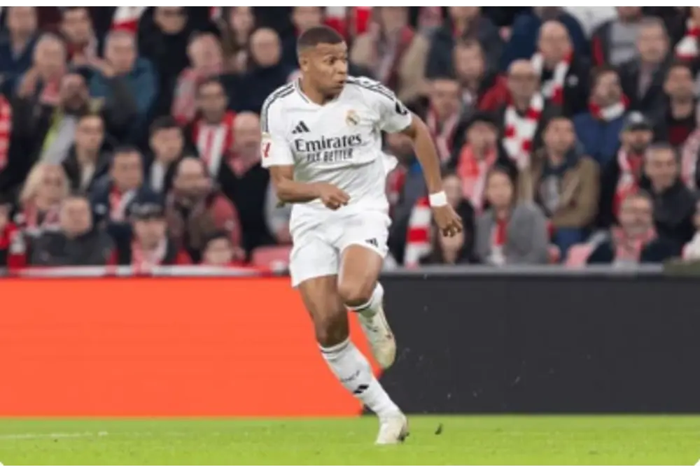 Mbappe unplayable vs Athletic Club in white kit sprinting with the ball during a La Liga match away to Athletic Club 