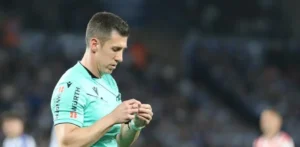 Match referee prepares for kickoff ahead of Betis vs Real Madrid in La Liga