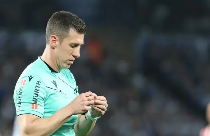 Match referee prepares for kickoff ahead of Betis vs Real Madrid in La Liga