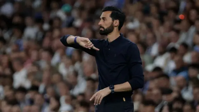 Real Madrid coach gestures from the touchline during a LaLiga match