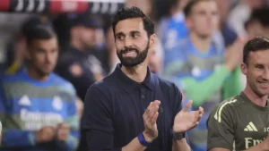 Real Madrid coach applauds from the sideline ahead of the Betis match as squad absences dominate the buildup