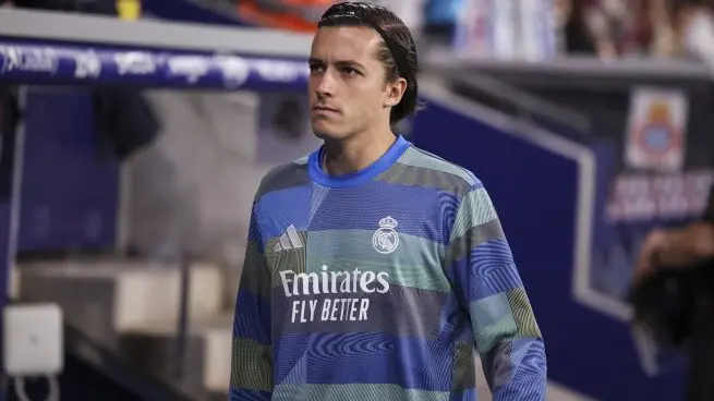 Alvaro Carreras Real Madrid: player in Real Madrid warm-up gear before a match in an image linked to his public statement