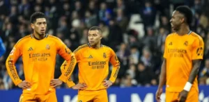 Bellingham Mbappe clash image showing Jude Bellingham, Kylian Mbappe, and a Real Madrid teammate during a match