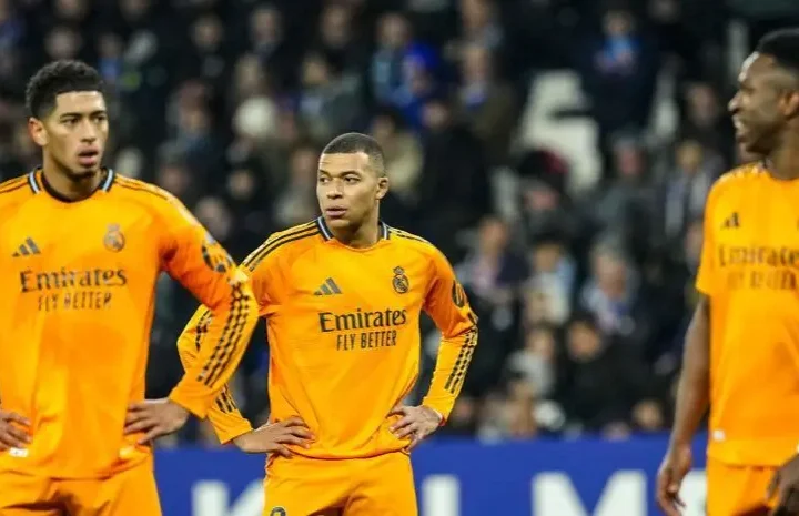 Bellingham Mbappe clash image showing Jude Bellingham, Kylian Mbappe, and a Real Madrid teammate during a match