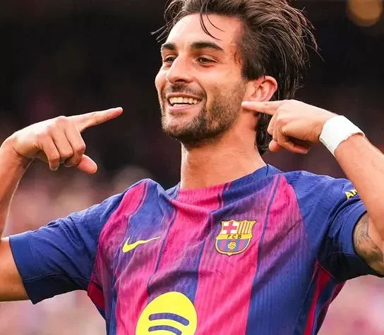 Barcelona player celebrates with hands raised after Ferran Torres El Clasico goal against Real Madrid