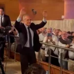Florentino Perez Real Madrid election launch image showing the club president greeting supporters during his campaign presentation