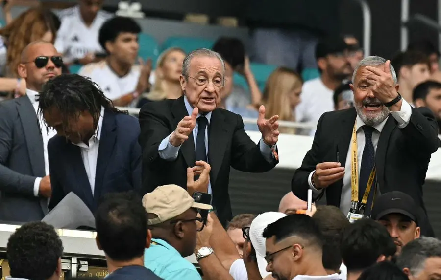 Featured image for Florentino Perez Real Madrid elections coverage during a tense moment involving club officials and supporters