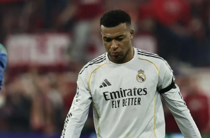 Florentino Perez angry with Mbappe story image showing a Real Madrid player walking with his head down in a white kit during a match