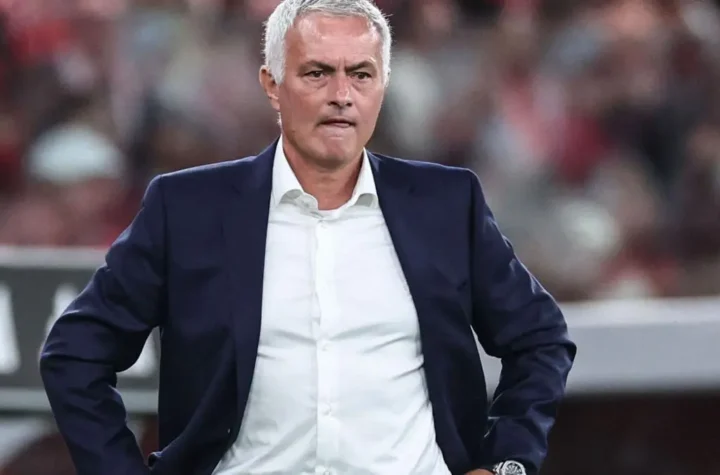 Jose Mourinho Real Madrid return feature image showing a football coach standing on the touchline during a match