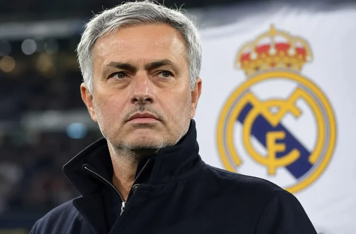 Jose Mourinho pictured in front of a Real Madrid crest amid reports that a return deal is agreed