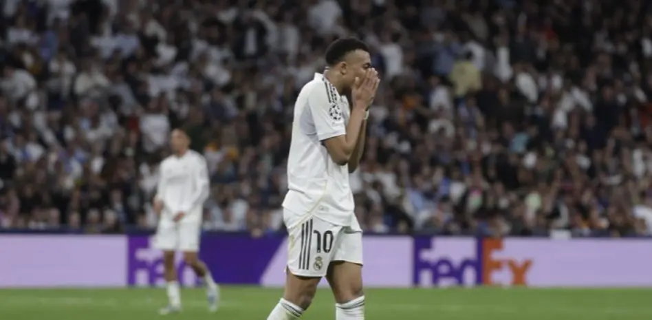Real Madrid backs Mbappe story image showing a Real Madrid player reacting with frustration during a match