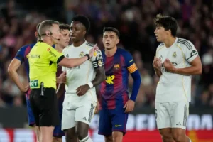 Real Madrid vs Barcelona result as the referee speaks with Real Madrid players during a tense Clasico moment that ended title hopes