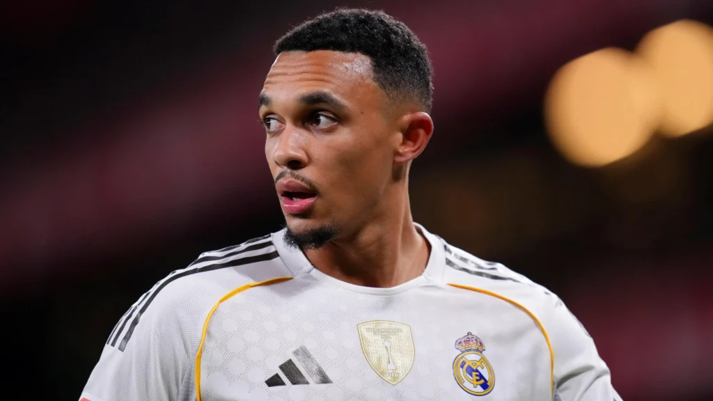 Featured image for Trent Alexander-Arnold left out of World Cup squad, showing a Real Madrid player in a white kit during a match