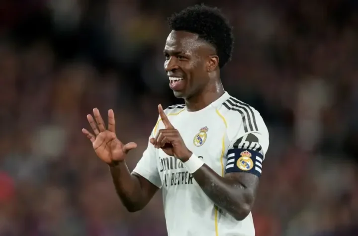 Vinicius Camp Nou gesture as a Real Madrid player makes a hand sign during El Clasico