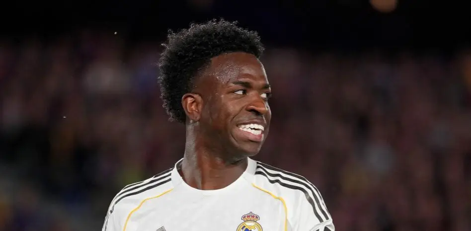Vinicius anti-racism office story image showing the Real Madrid winger smiling in his white kit during a match