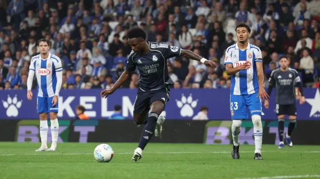 Vinicius brace moment as a Real Madrid attacker strikes the ball during the win over Espanyol.