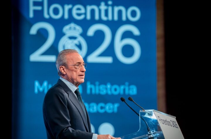 Florentino Pérez speaks at a podium in front of his 2026 campaign banner before the Real Madrid presidential election