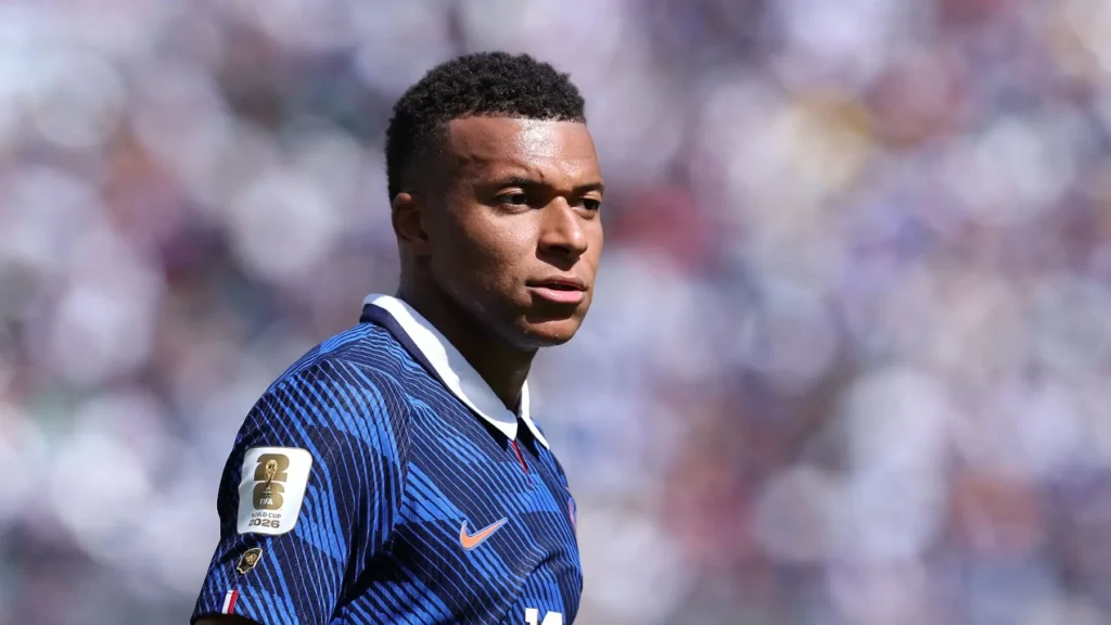 France player in a blue national team kit during a World Cup match