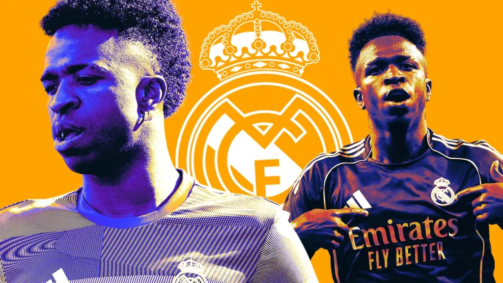 Vinicius contract renewal graphic with two stylized football portraits and the Real Madrid crest on an orange background