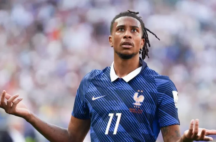 Michael Olise Real Madrid featured image showing a footballer in a France national team jersey during a transfer story