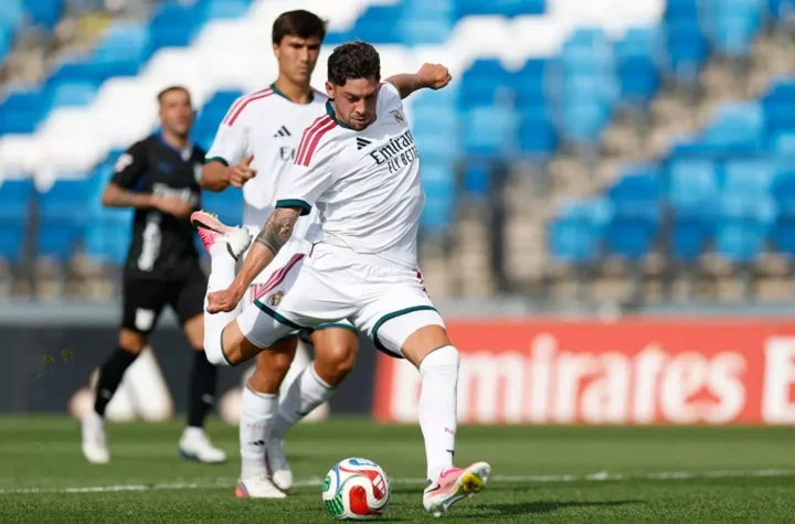 Real Madrid vs Fiorentina live stream featured image showing a Real Madrid player striking the ball during the preseason friendly