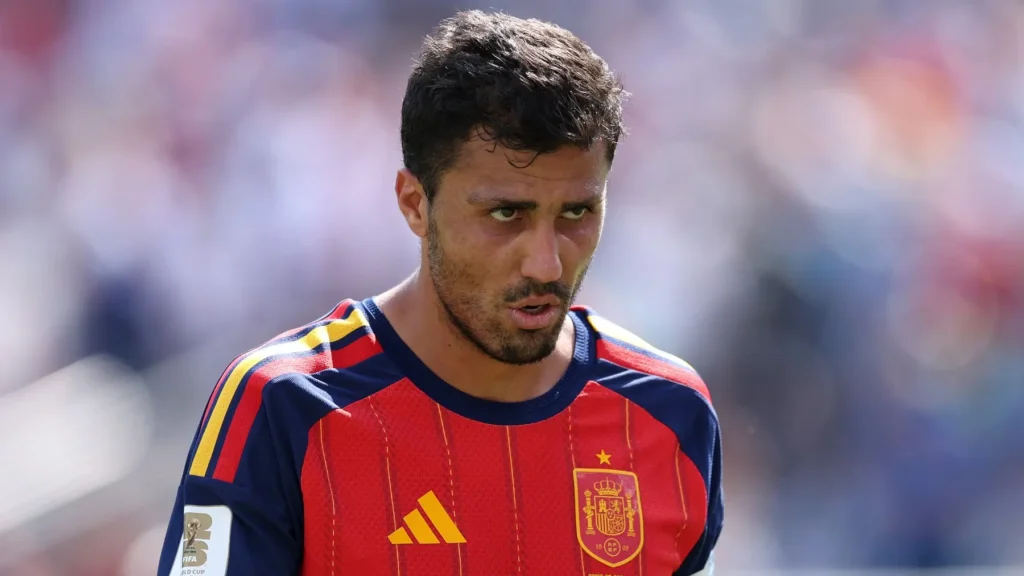 Rodri Real Madrid transfer featured image showing the Spain midfielder during a major injury-related transfer update