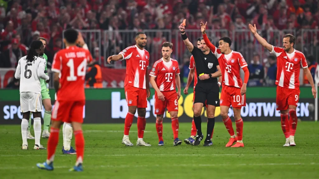 Slavko Vincic Real Madrid featured image showing the referee issuing a red card during Bayern Munich vs Real Madrid