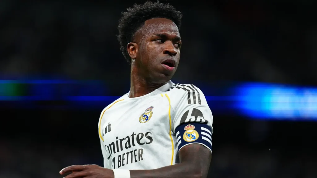 Real Madrid forward wearing the captain’s armband during a match following the Vinicius contract renewal announcement.
