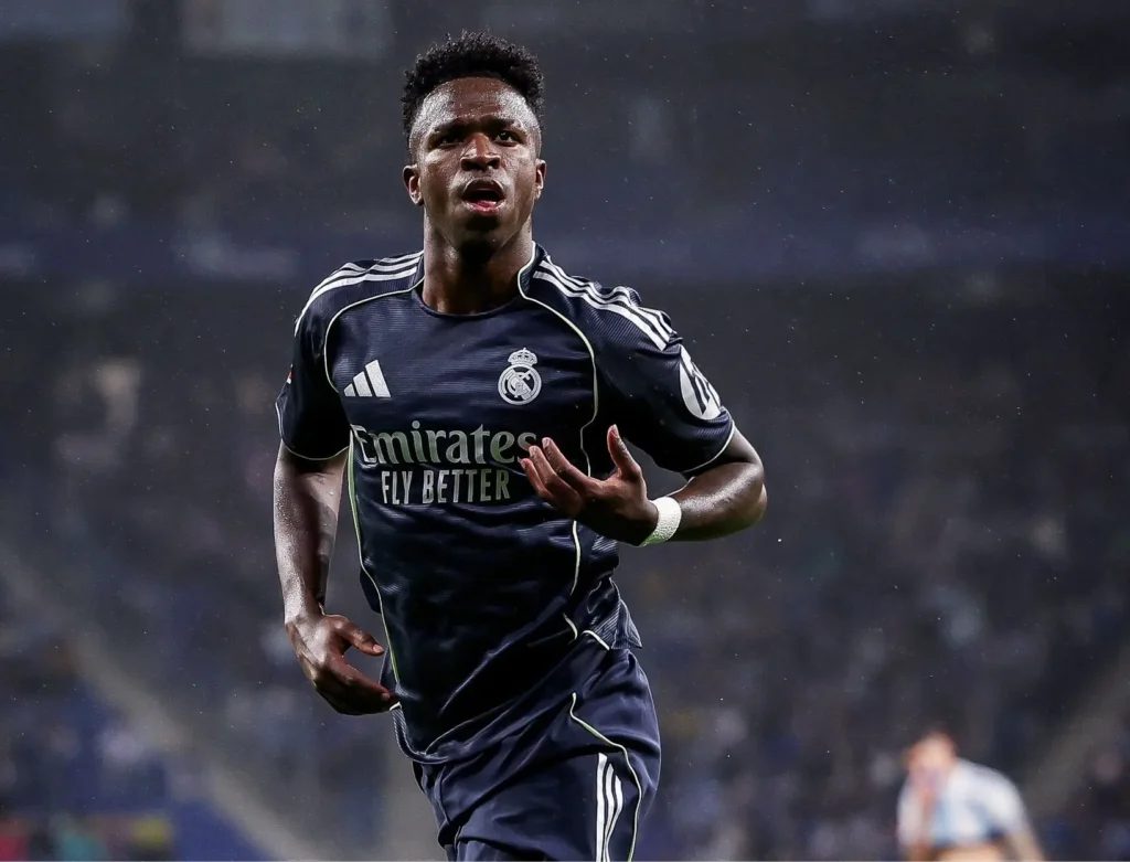 Vinicius Jr contract renewal talks continue as the Real Madrid forward runs during a match.
